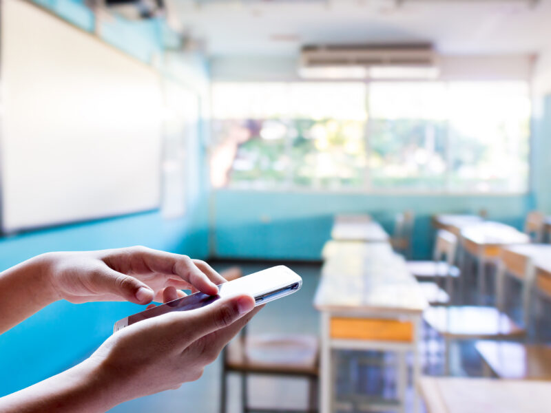 teacher using phone