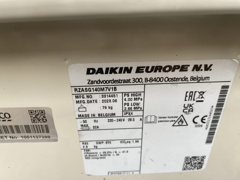 Label on a Daikin Europe device showing model RZASG140MV1B with technical specifications, including manufacturing date, power supply, and location details in Belgium.